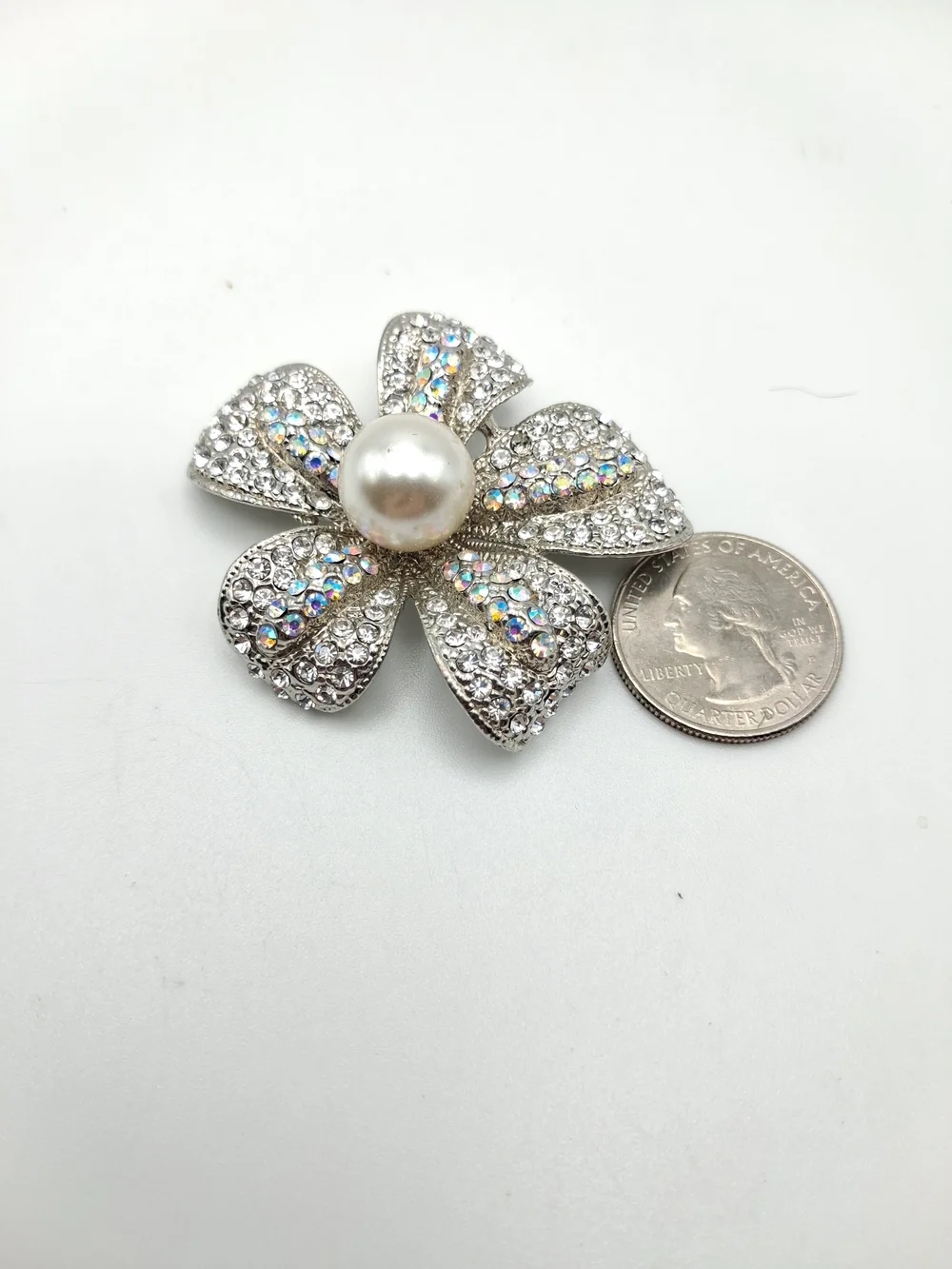 PM 369. Silver Crystal Plumeria Brooch with Pearl Center